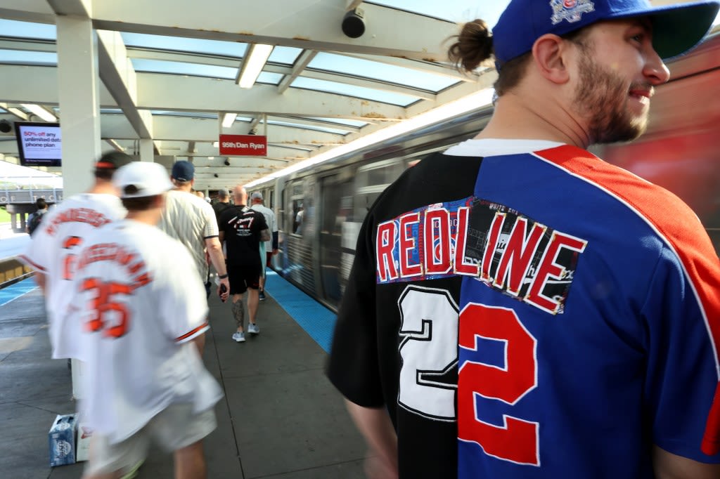 Photos: Let’s watch two – Baseball fans ride the rails for the Red Line doubleheader
