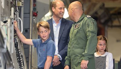 Prince George enjoys first flying lesson as Prince William and Kate watch - report