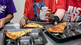 US officials propose new rules for school meals, including first limits on sugars. Here's what to know.