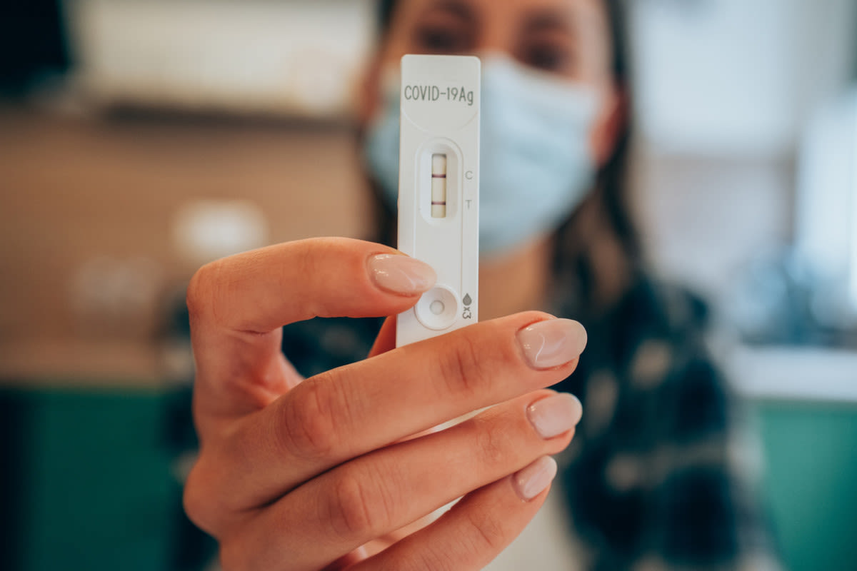 This Is How Long You’ll Probably Test Positive for COVID, Say Infectious Disease Docs