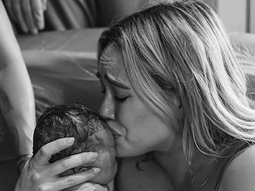 Hilary Duff tearfully holds baby daughter after water birth in emotional pics