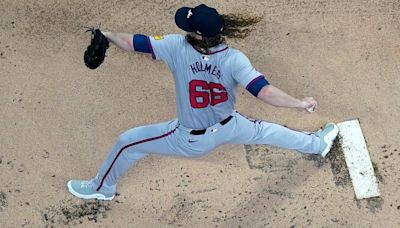 Braves lose after Grant Holmes continues feel-good story with strong start