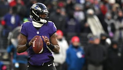 John Harbaugh says Lamar Jackson will go down as 'greatest quarterback' in NFL history