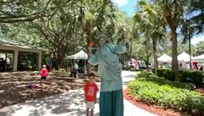 Families in South Palm Beach County try to stay cool during Fourth of July block party event