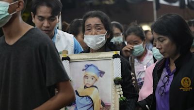 Bodies of the children and teachers who died in a Thai school bus fire return home for funeral