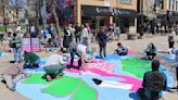 Volunteers give Madison's State Street a makeover as part of pedestrian experiment