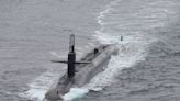 US Navy nuclear ballistic missile submarine surfaces off Norway in unusual flex as 'Doomsday' plane flies overhead