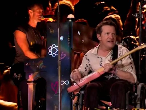 Michael J. Fox joins Coldplay to perform on Glastonbury stage as Chris Martin reveals how actor helped form band