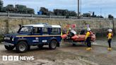 Two people and dog caught out by Holy Island causeway