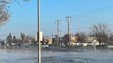 Water main breaks, floods street near Fresno shopping center. Brawley closed to traffic