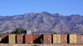 Federal government sues over Gov. Doug Ducey's shipping container wall at border