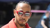 F1 racer Lewis Hamilton undergoes jewelry inspection, addresses nose ring query, gets cleared to race