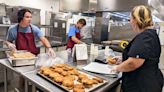 Short-staffed school districts are hiring students to serve lunch