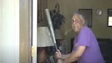 Watch as grandmother fends off robber with baseball bat