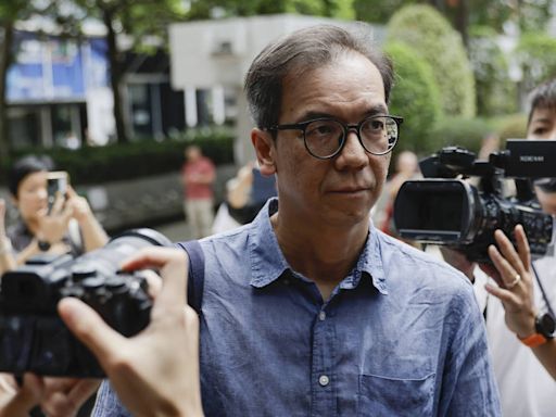 Hong Kong court sentences former editor to 21 months in jail