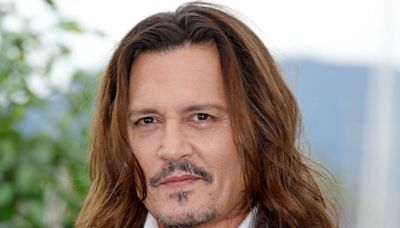 Johnny Depp shows off major dental transformation after shocking fans with ‘rotting’ teeth