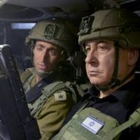 A handout image made available by the Israeli Prime Minister Benjamin Netanyahu's office shows him in Rafah, in the southern Gaza Strip, where he visited troops