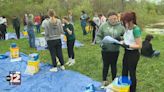 Armstrong Middle School students test water at local creek