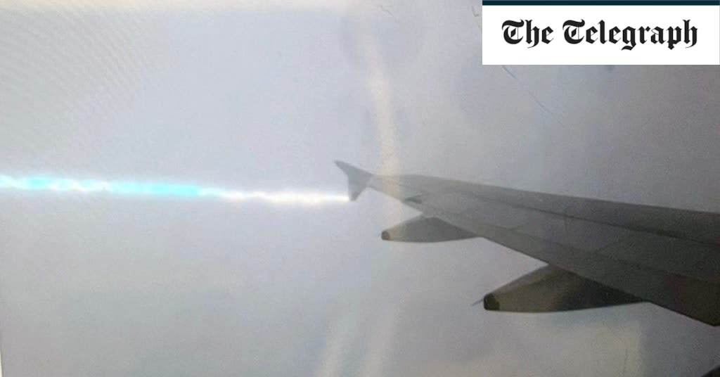 Passengers record moment British Airways plane struck by lightning