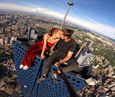 'Rooftopping is my art form': The death-defying couple who climb the world's tallest skyscrapers