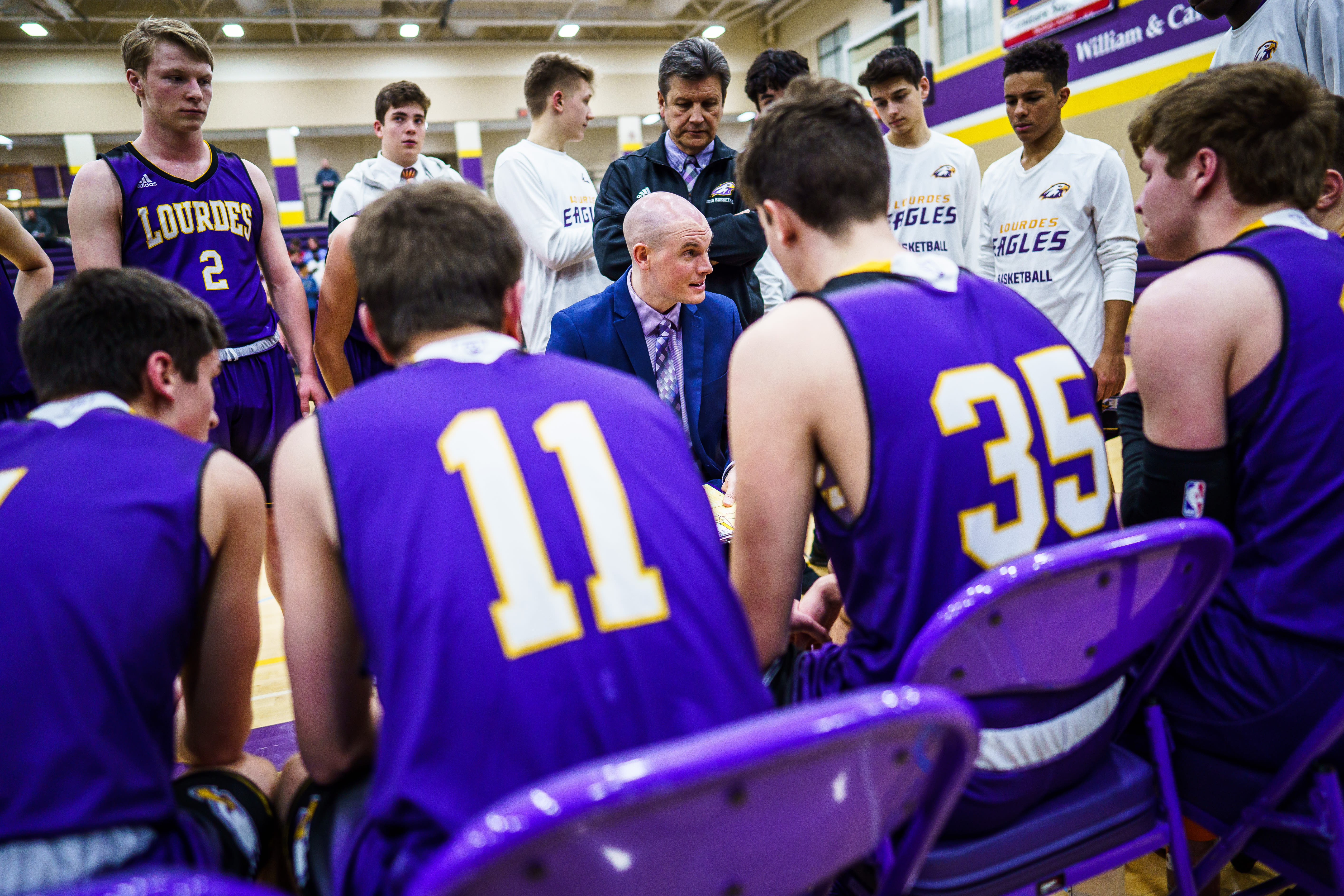 Eric Larson, Lourdes activities director, announces he is leaving the school