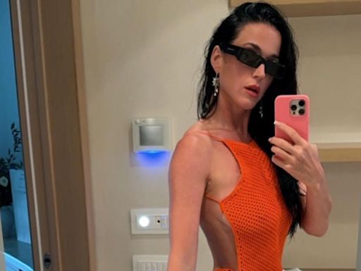 Katy Perry Looks Like an Alien on the Beach Wearing Iridescent Rubber Rings as a swimsuit