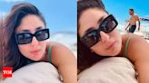 Saif Ali Khan photobombs wife Kareena Kapoor’s beach selfie from London - See photos | - Times of India