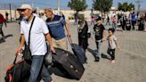 Foreign nationals and injured Palestinians allowed to flee Gaza for first time since Israel-Hamas war began