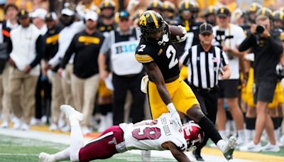 Hawkeyes use run game, big second half to beat Troy