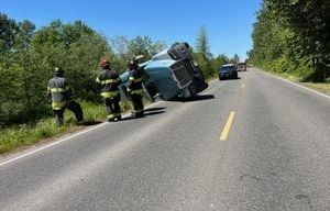 Overturned semi-truck blocks traffic in Puyallup