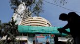 Indian shares end off record highs as traders book profits
