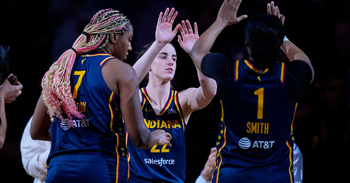 Raucous crowd roars its approval for Caitlin Clark in her home debut with Fever, an 83-80 win