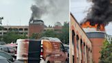 Shopping centre catches fire as huge plumes of smoke rise into the sky