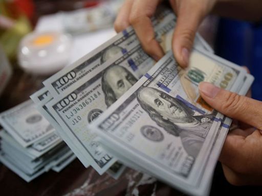 Dollar steady at start of busy week of central bank meetings