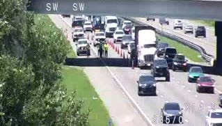 Truck hauling crane hits Enterprise Road overpass at I-4, backing up traffic for 7 miles