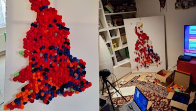 Couple create election map covered in red pom poms after tracking results