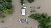 Watch: Drone footage of flooding in Nashville, Illinois, after a dam failed.