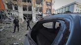 The death toll in Kharkiv attack rises to 14 as Zelenskyy warns of Russian troop movements