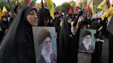 Iran’s supreme leader prays over the coffin of Hamas leader Haniyeh, whose killing risks a wider war