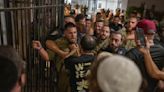 A day of chaos in Israel as far-right protesters storm military bases