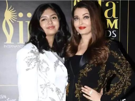 Amid divorce rumours with Abhishek Bachchan, Aishwarya Rai smiles as she returns to Mumbai with Aaradhya after 2024 IIFA Utsavam Awards, fans say, 'Even though she is a...' WATCH