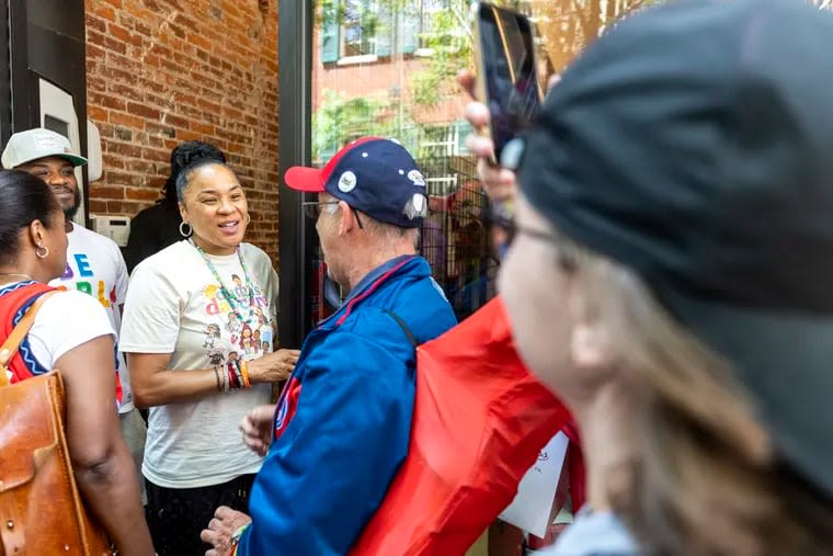 Fans lined up for hours to meet legendary basketball coach Dawn Staley at Mitchell & Ness