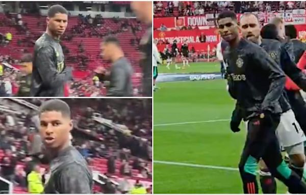 Marcus Rashford pulled away by teammates after row with Manchester United fan in stands