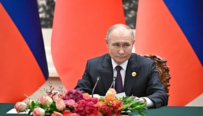A Pariah In The West, Putin Finds Fans In Beijing