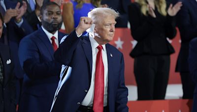 Trump makes dramatic appearance at RNC just days after being shot during assassination attempt