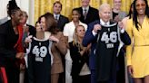 ...President Joe Biden and Vice President Kamala Harris are presented jerseys as they welcome the Las Vegas Aces to celebrate...