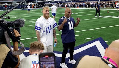 Why was boxer Mike Tyson at Cowboys-Saints game on Sunday?