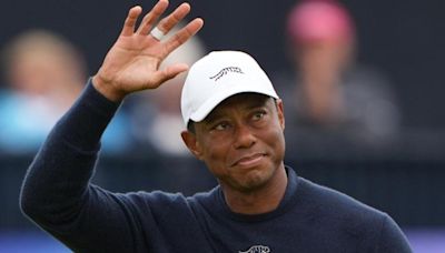Tiger Woods bows out but refuses to throw in the towel