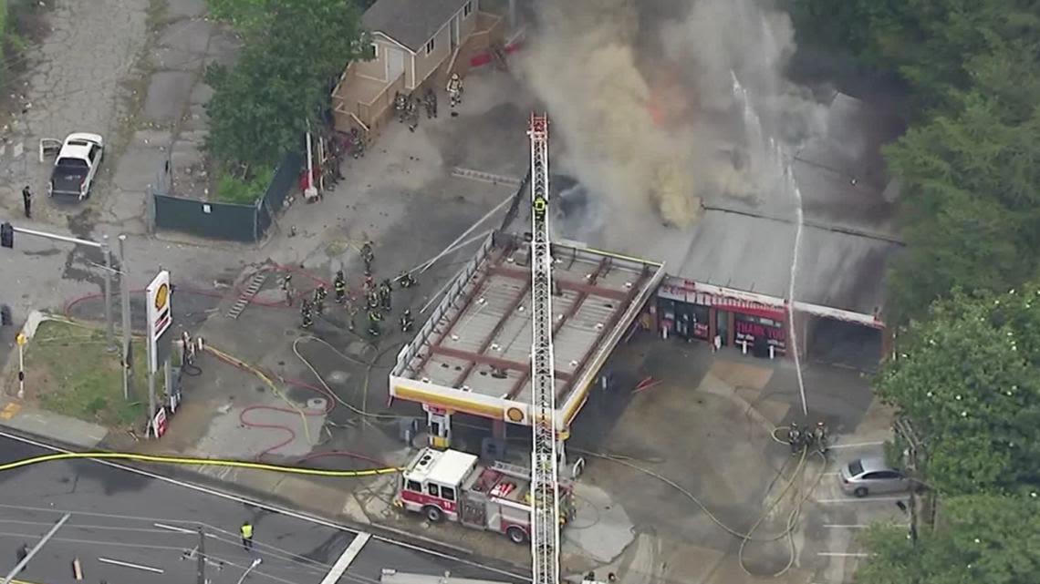 Smoke billows after large fire breaks out at gas station off I-75