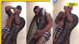 Man bathes with massive python in terrifying viral video, watch